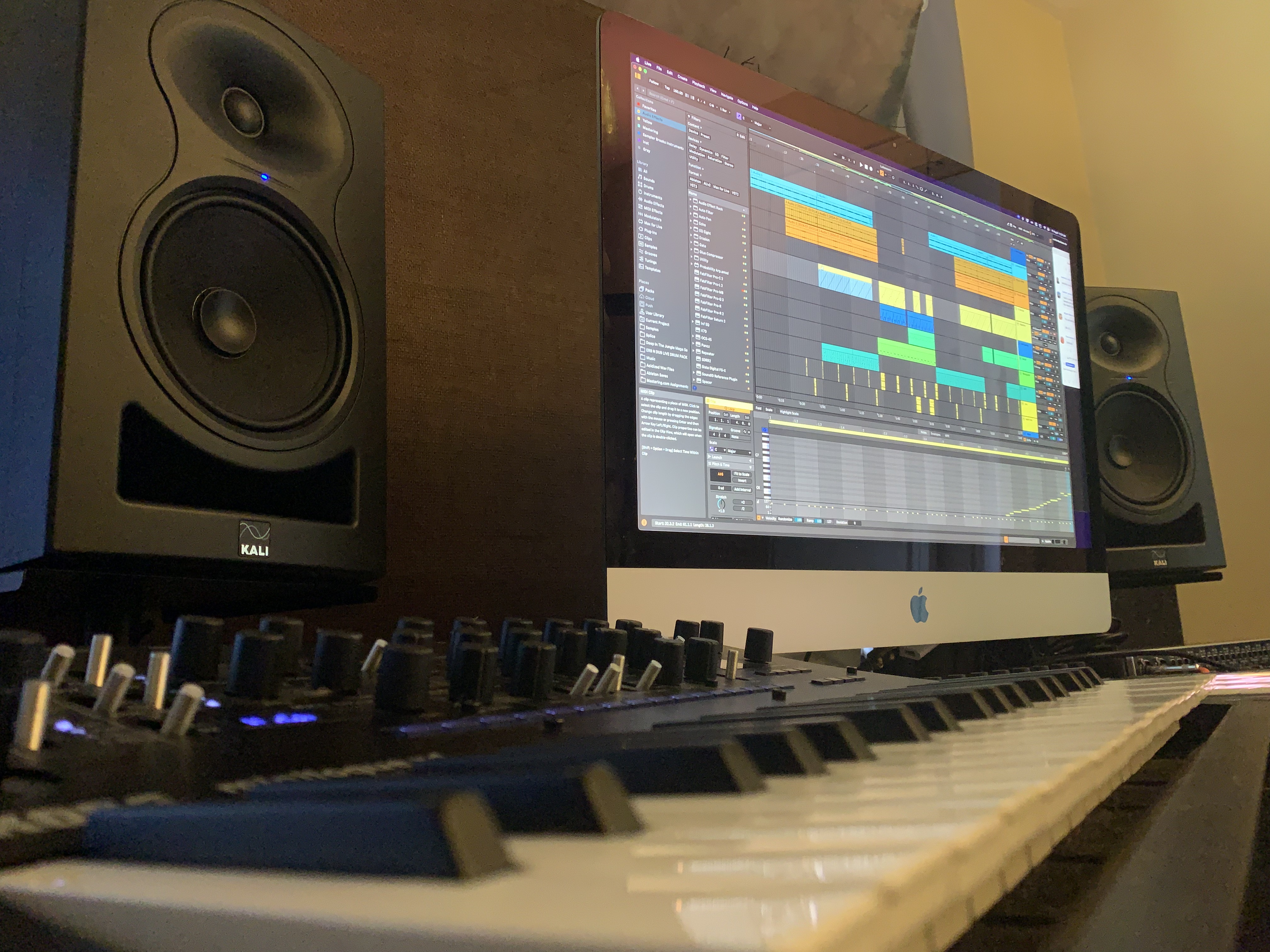 A photorealistic image showcasing a split-screen view: On one side, a detailed close-up of a digital audio workstation interface with complex plugins and waveforms. On the other side, a vintage analog mixing console with glowing VU meters and intricate knobs. The lighting is soft and balanced, highlighting the details of both technologies. Color palette: deep blues and greens for digital, warm oranges and reds for analog. The composition emphasizes the interplay between the two technologies. 4K resolution.